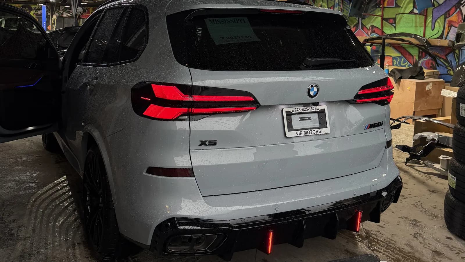 Aftermarket rear diffuser fitted to a BMW X5 at Buff X Customization