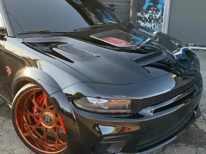Black widebody Dodge Charger on copper forged wheels at Buff X Customization