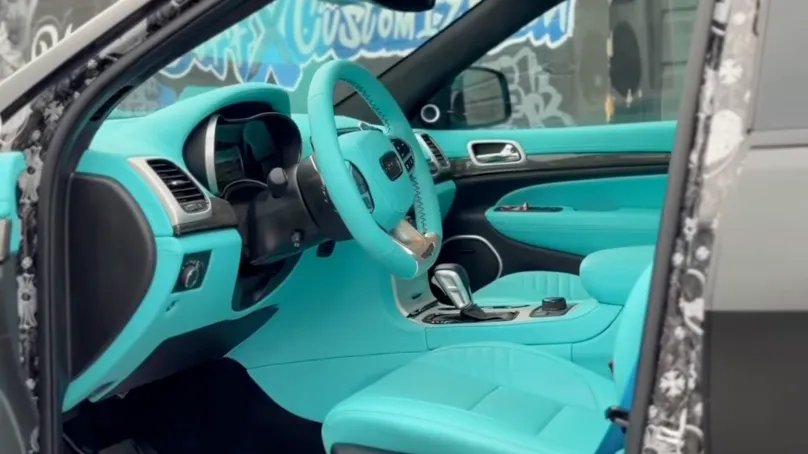 Teal custom interior in a Jeep Trackhawk at Buff X Customization