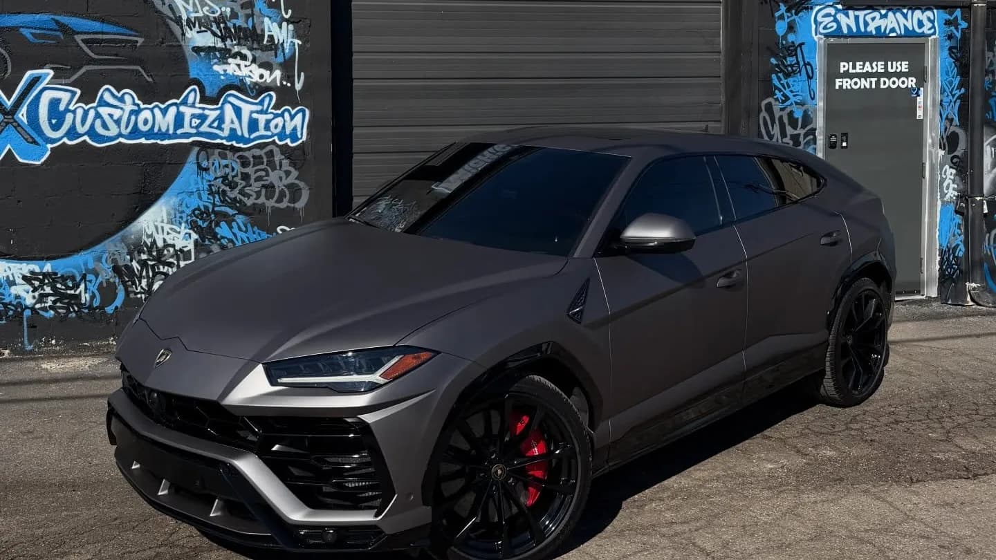 Gray Lamborghini Urus outside Buff X Customization in Dearborn Heights