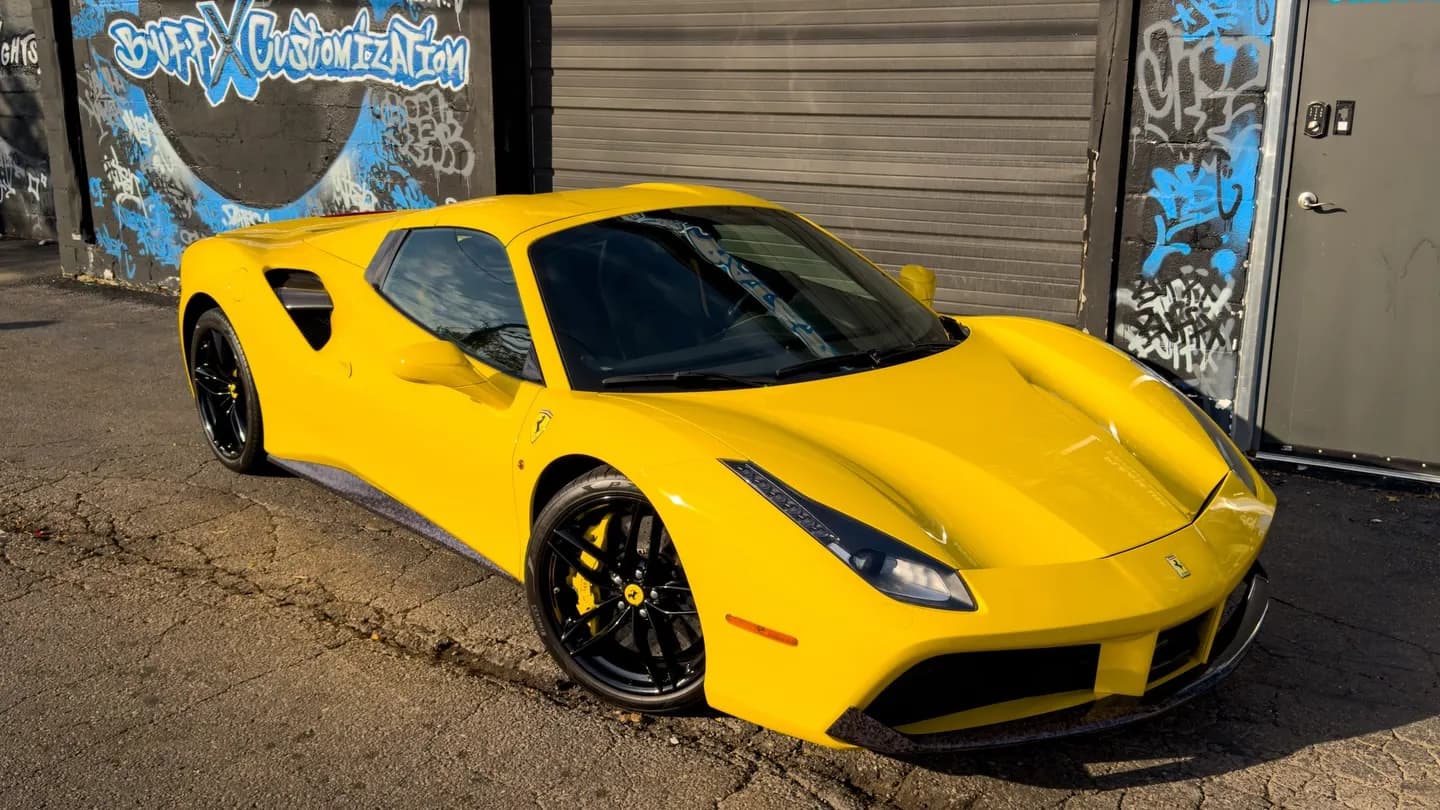 Yellow Ferrari 488 Spider with paint protection film outside Buff X Customization in Dearborn Heights