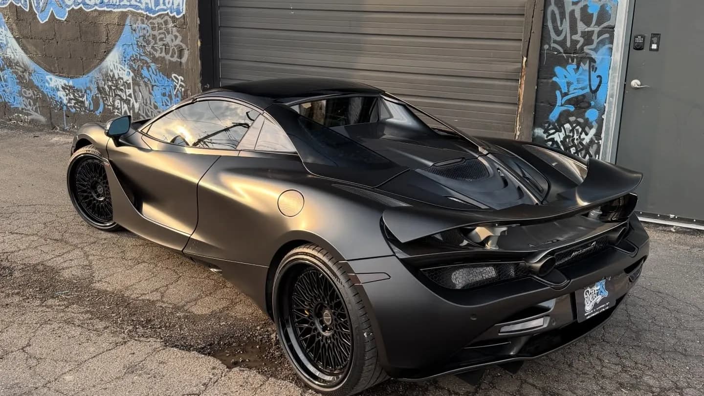 Matte black McLaren 720S Spider with stealth paint protection film outside Buff X Customization in Dearborn Heights