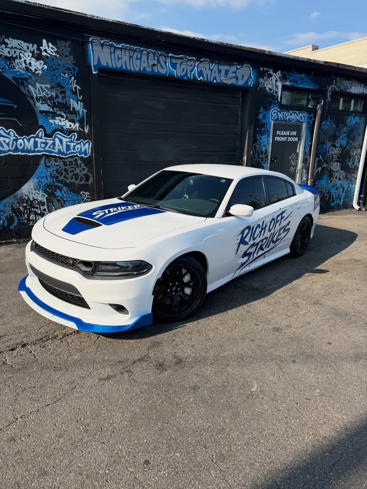 White Dodge Charger in a custom printed graphics wrap at Buff X Customization