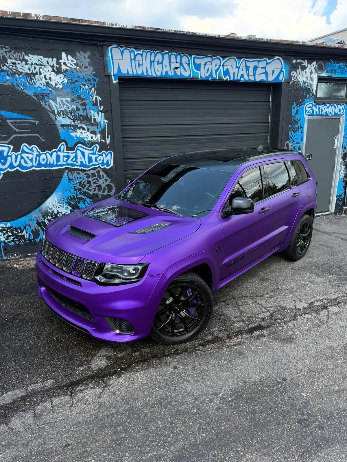 Jeep Trackhawk wrapped in purple at Buff X Customization
